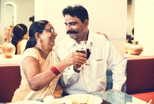 A happy Indian couple spending time together - Stock Photo - Images