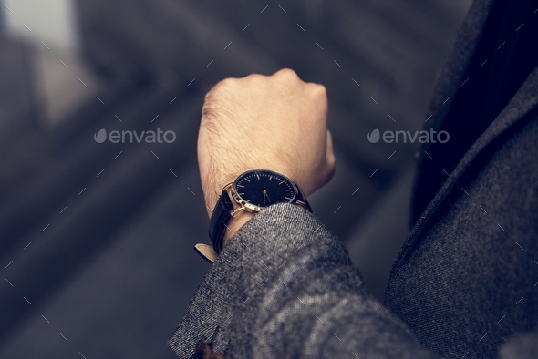 Man looking at his watch Stock Photo by Rawpixel | PhotoDune