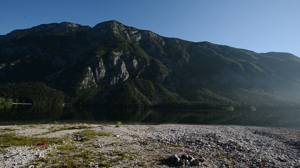 Amazing Bohinj Lake in the Morning. Deep Clear Water with Fish and Gorgeous Landscape of Bohinj