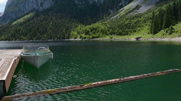 Beautiful Boats at the Pier on the Lake in the Alps