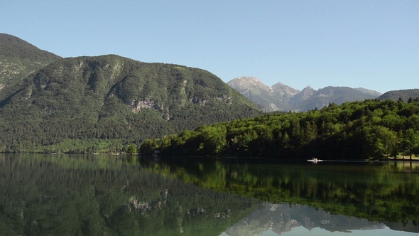 Amazing Bohinj Lake in the Morning. Deep Clear Water with Fish and Gorgeous Landscape of Bohinj