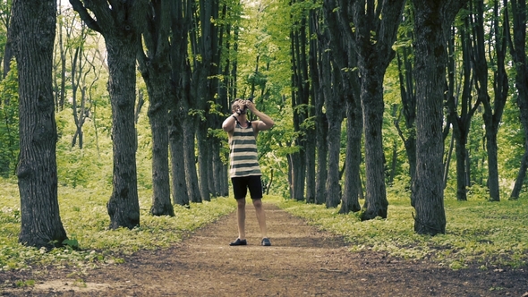 Man Takes Pictures on a Journey