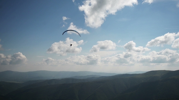 Following Parachute Silhouette