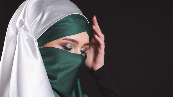 Young Islamic Woman in National Costume Posing for the Camera, Stock ...