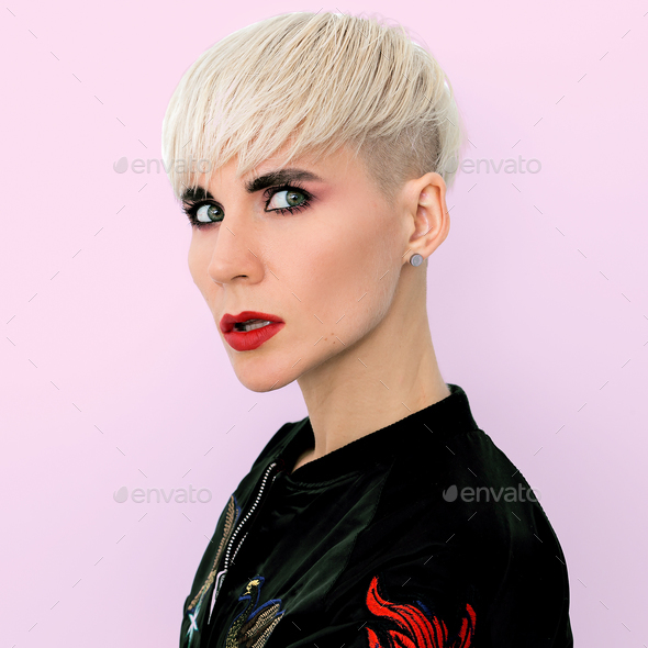 Blonde Model with short fashion haircut Tomboy style Stock Photo by  EvgeniyaPorechenskaya