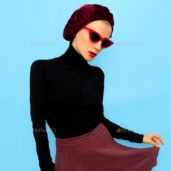 Model in a fashion accessory beret and sunglasses. Vintage style - Stock Photo - Images