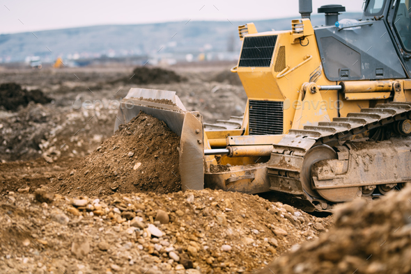 Download Highway Construction Site Close Up With Industrial Machinery Excavator And Bulldozer Working Stock Photo By Stockcentral
