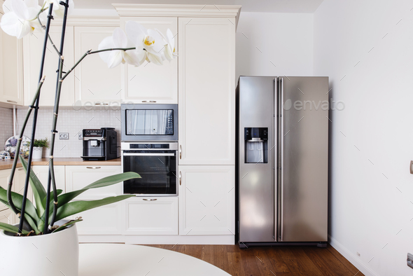 Modern appliances and new design in kitchen. Loft kitchen and apartment Stock Photo by stockcentral