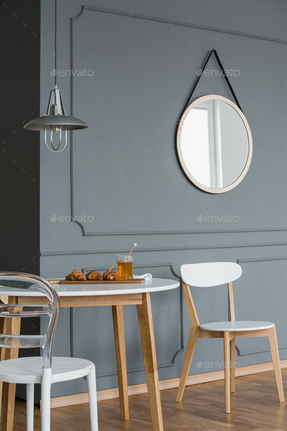 Mirror on wall with molding