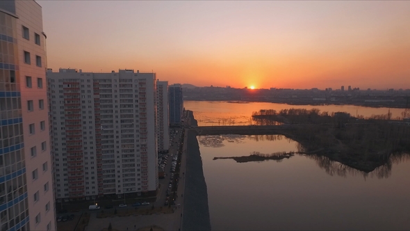 Aerial View Shot Sunset Over the New District on the Banks of the Yenisei River. Krasnoyarsk, Russia