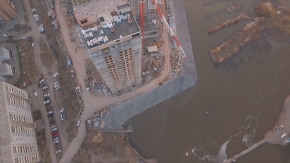 Aerial View Shot of the Sunset on the Construction of a New District on the Bank of the Yenisei