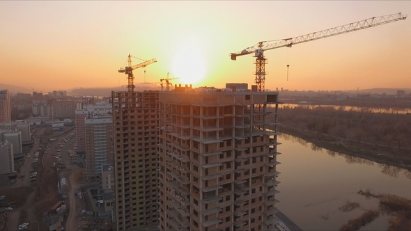 Sunset on the Construction of a New District on the Bank of the Yenisei