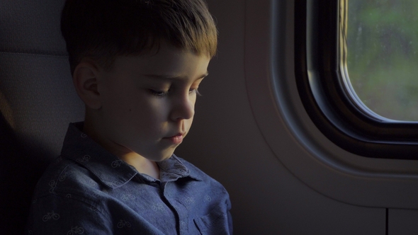 Boy Who Travels in Transport