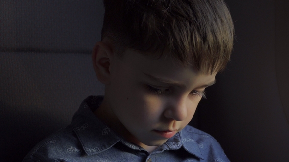 Boy Who Travels in Transport