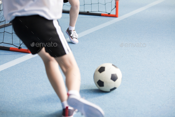 Boy playing soccer - Stock Photo - Images