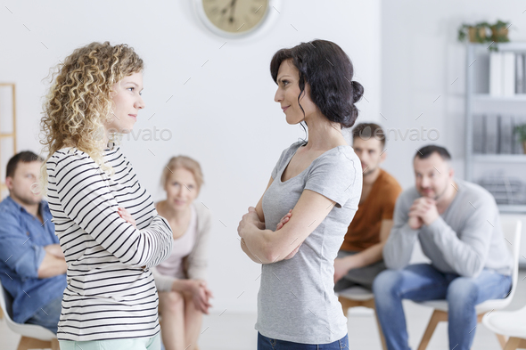 Two women during group psychotherapy Stock Photo by bialasiewicz | PhotoDune