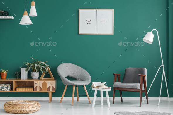 Posters in green living room Stock Photo by bialasiewicz | PhotoDune