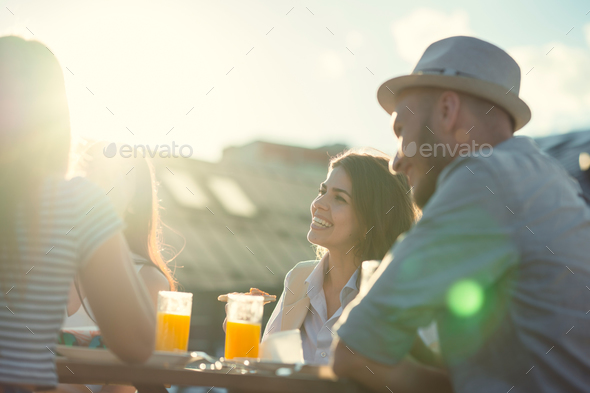 Young attractive people on the roof Stock Photo by AboutImages | PhotoDune