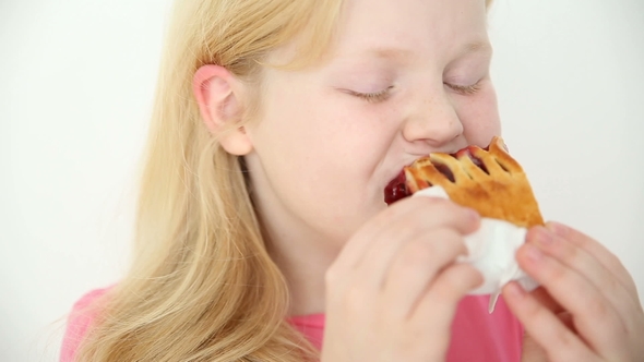 Blonde Girl Eats Cherry Pie on White Background