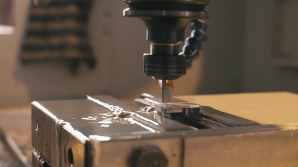 CNC Milling Machine with Water Cooling at Work