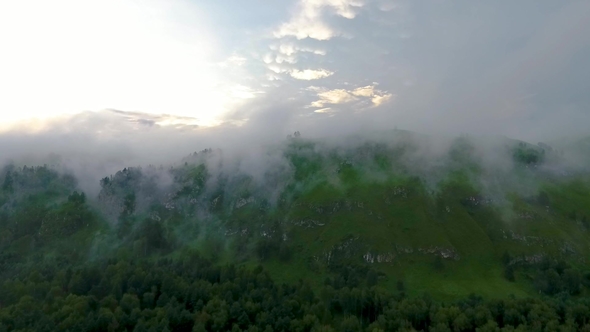 Aerial View of the Katun River and Hills During the Fog After the Rain. The Republic of Altai