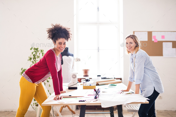 Young creative women in a studio, startup business. - Stock Photo - Images