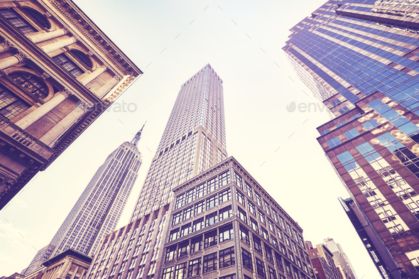 Vintage stylized photo of Manhattan skyscrapers, NY. - Stock Photo - Images