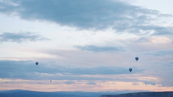 Balloons Float through the Sky in Cappadocia