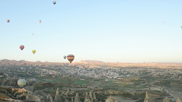 Balloons Float through the Sky in Cappadocia