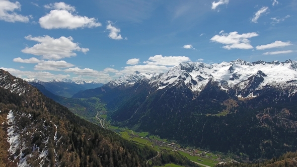 Aerial View on Snow Mountains in Switzerland Alps alt