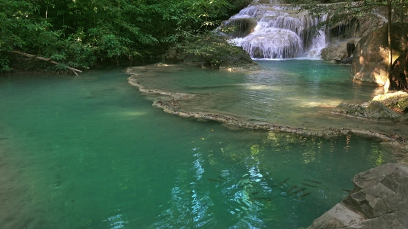 Erawan Waterfall with Fish in Water in Thailand alt