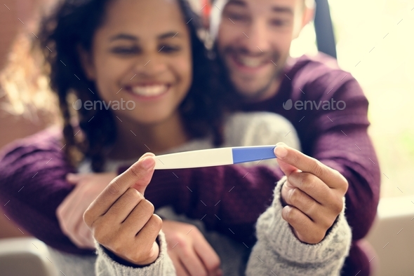 Happy couple with pregnancy news - Stock Photo - Images