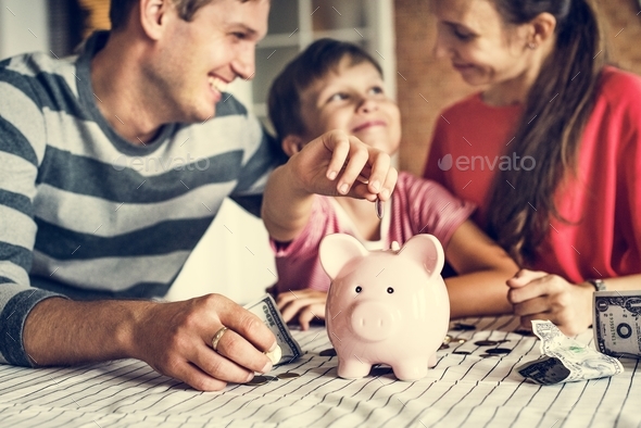 Kid earning money for future - Stock Photo - Images