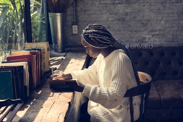 Portrait of black woman with dreadlocks hair - Stock Photo - Images