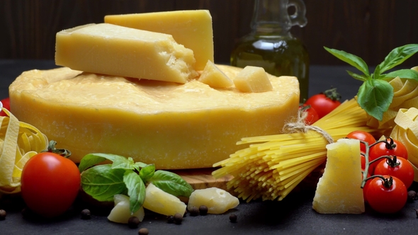 Video of Traditional Italian Food - Parmesan Cheese, Pasta, Tomato and Olive Oil alt