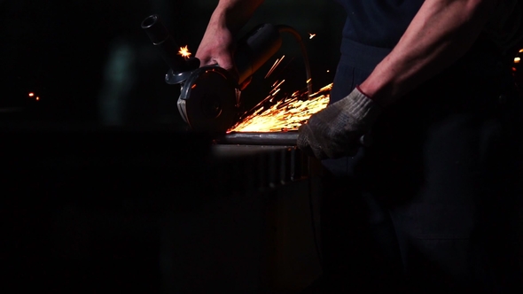 Industrial Engineer Working on Cutting Steel with Compound Mitre Saw alt