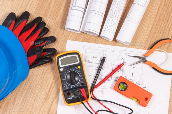 Electrical drawings, multimeter for measurement in electrical installation Stock Photo by ratmaner