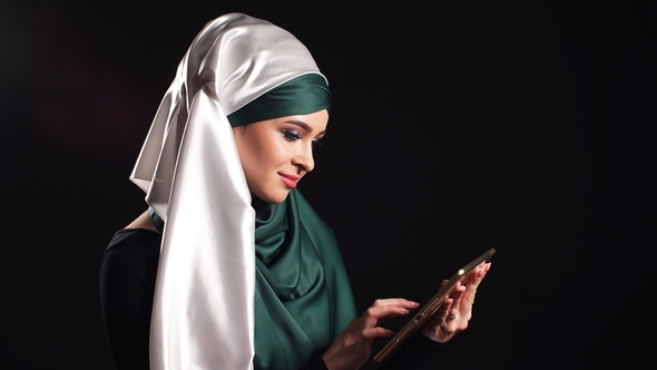 Portrait of Beautiful Arabic Muslim Girl Using Mobile Phone., Stock Footage