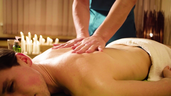 Chinese Massage Therapist Doing Massage
