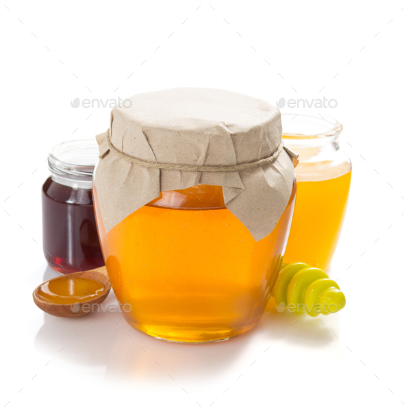 glass jar of honey - Stock Photo - Images