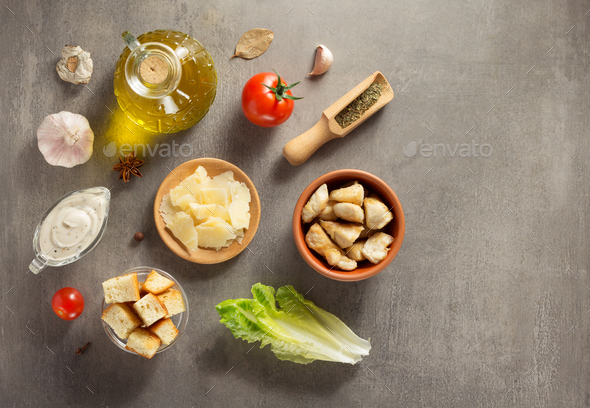 caesar salad ingredients at stone table Stock Photo by seregam | PhotoDune