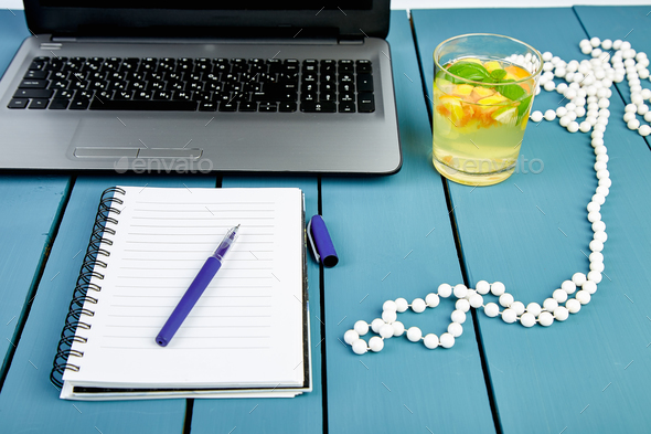 Modern women workplace with notebook or laptop. - Stock Photo - Images