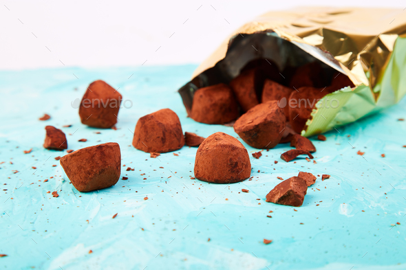 Chocolate Candy truffles fall out - Stock Photo - Images