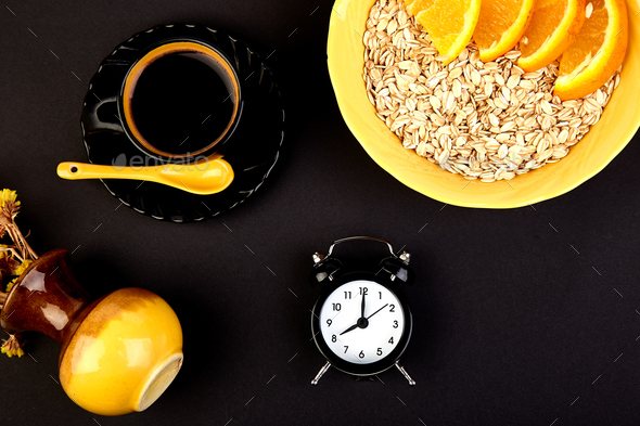 Morning coffee, granola breakfast, alarm clock - Stock Photo - Images