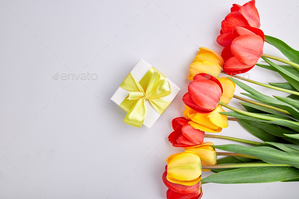 White gift box with yellow ribbon - Stock Photo - Images