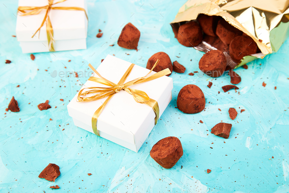 Chocolate Candy truffles fall out - Stock Photo - Images