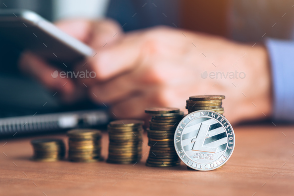 Litecoin cryptocurrency trader - Stock Photo - Images