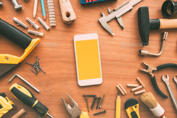Repairman smart phone with blank screen - Stock Photo - Images
