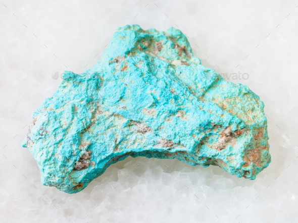 rough Turquoise gemstone on white - Stock Photo - Images
