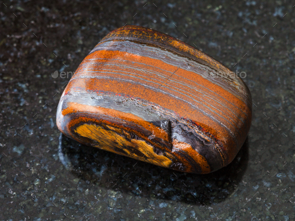 Jaspillite (Taconite Jasper) gemstone on black - Stock Photo - Images
